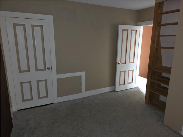 17 Lake St, Mount Morris, NY 14510 - carpeted empty room with baseboards