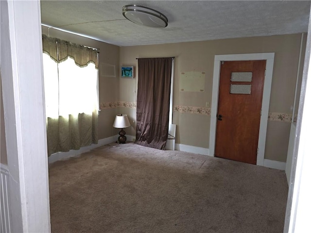 17 Lake St, Mount Morris, NY 14510 - empty room featuring carpet and a textured ceiling