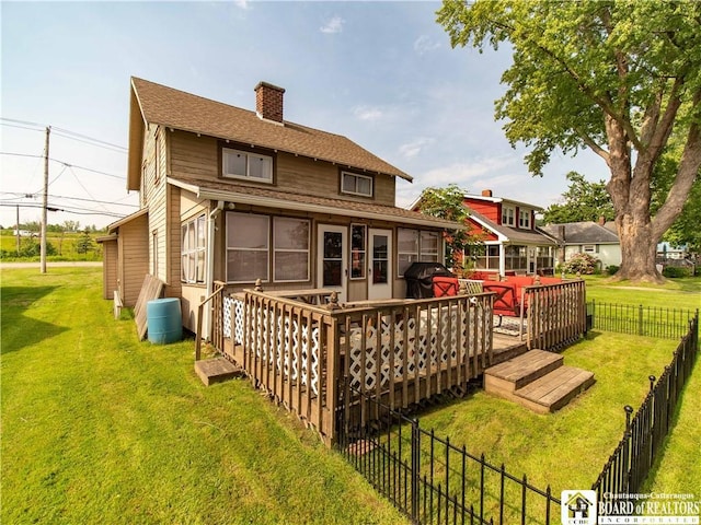 3971 Rte 430, Ellery, NY 14712 - rear view of property featuring a chimney, a deck, a fenced backyard, roof with shingles, and a sunroom