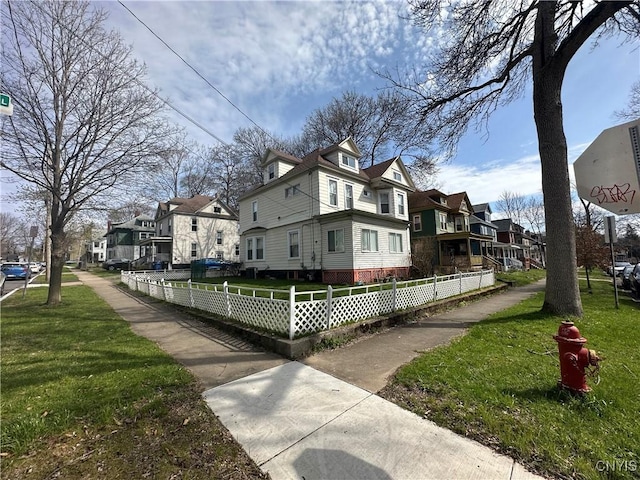 101 Avondale Pl, Syracuse, NY 13210 - view of home's exterior with a residential view and a fenced front yard