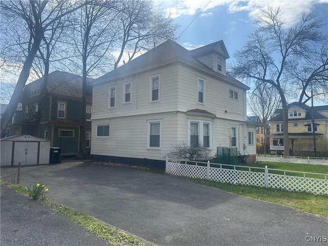 101 Avondale Pl, Syracuse, NY 13210 - view of side of property with a storage unit