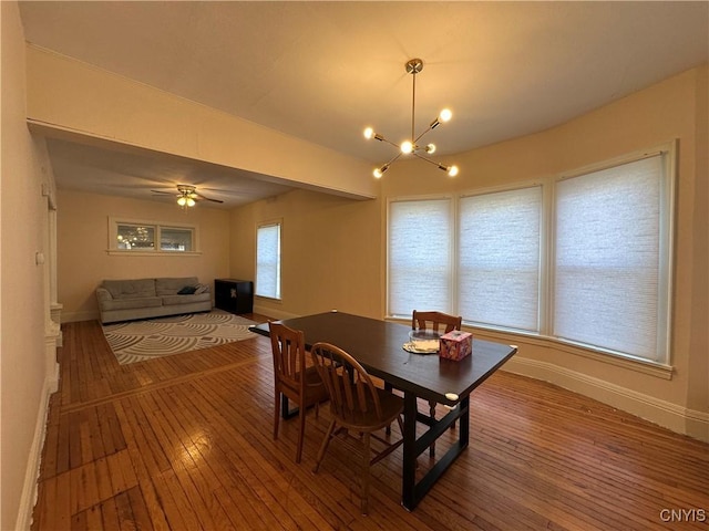 101 Avondale Pl, Syracuse, NY 13210 - dining room featuring wood-type flooring and a chandelier