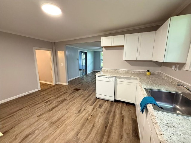 73 E River St, Fayette, NY 13165 - kitchen featuring dishwasher, ornamental molding, light wood finished floors, and white cabinets