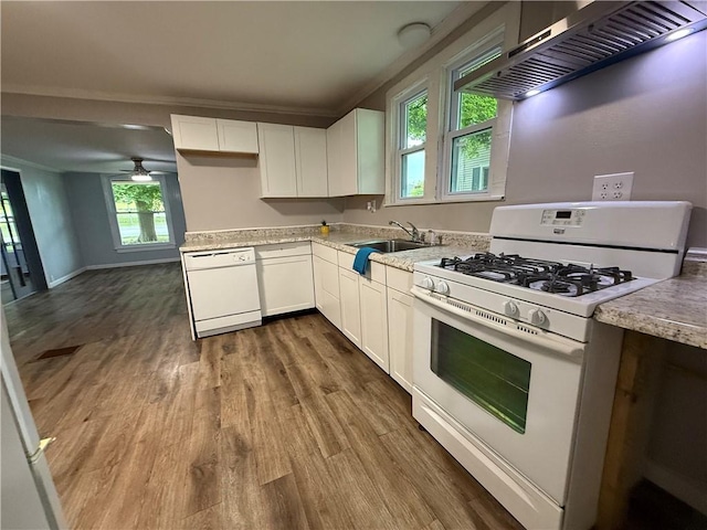 73 E River St, Fayette, NY 13165 - kitchen with white appliances, custom exhaust hood, dark wood-type flooring, white cabinetry, and ceiling fan