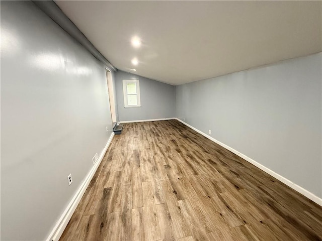 73 E River St, Fayette, NY 13165 - unfurnished room with lofted ceiling and wood finished floors