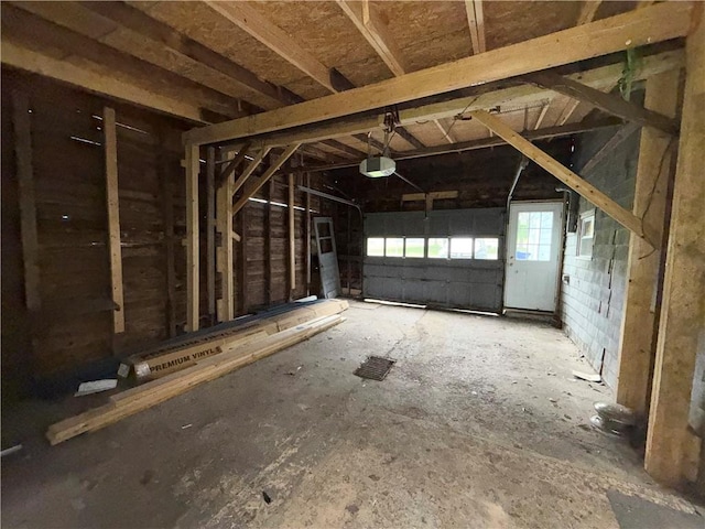 73 E River St, Fayette, NY 13165 - garage featuring a garage door opener