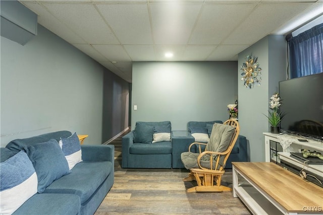 221.5 Lakeview Ave, Syracuse, NY 13204 - living area with wood finished floors and a drop ceiling