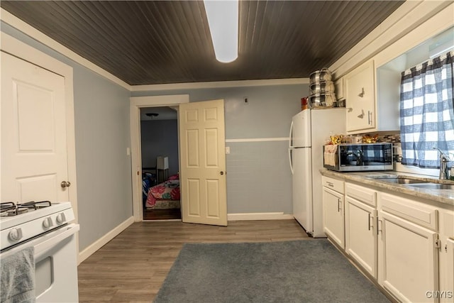 220 Lakeview Ave, Syracuse, NY 13204 - kitchen with white appliances, white cabinetry, and dark wood-style flooring