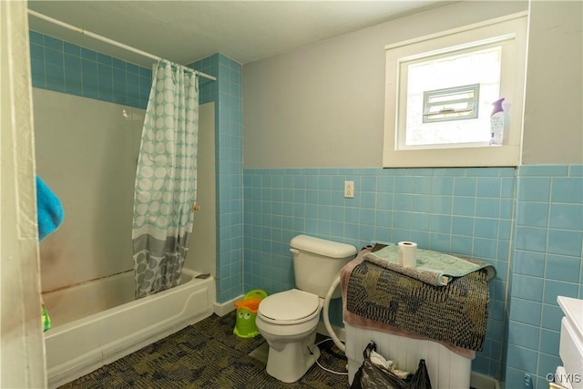 220 Lakeview Ave, Syracuse, NY 13204 - bathroom with tile walls, shower / bathtub combination with curtain, and a wainscoted wall