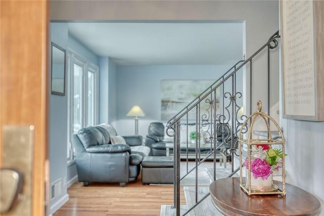 21 Wethersfield Rd, Chili, NY 14624 - living area featuring wood finished floors and stairs