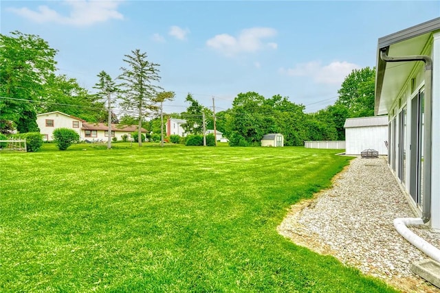 21 Wethersfield Rd, Chili, NY 14624 - view of grassy yard featuring a storage unit
