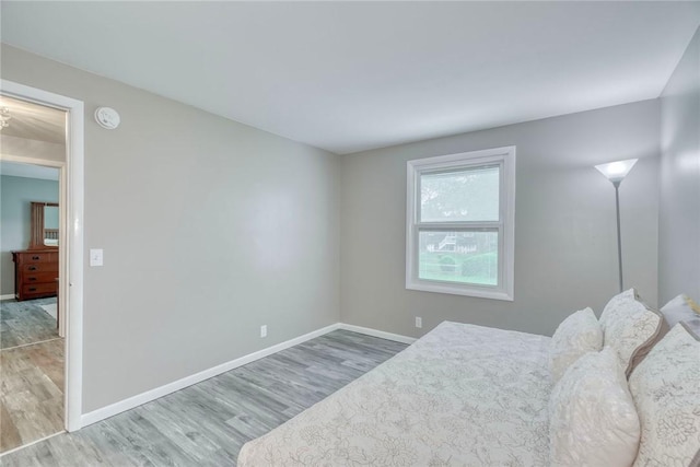 21 Wethersfield Rd, Chili, NY 14624 - bedroom with wood finished floors and baseboards
