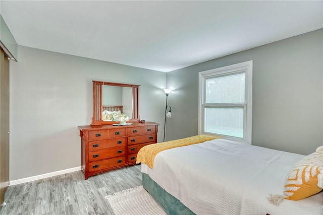21 Wethersfield Rd, Chili, NY 14624 - bedroom with light wood-style flooring and baseboards