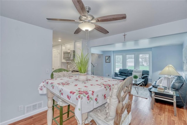 21 Wethersfield Rd, Chili, NY 14624 - dining space featuring light wood finished floors and ceiling fan