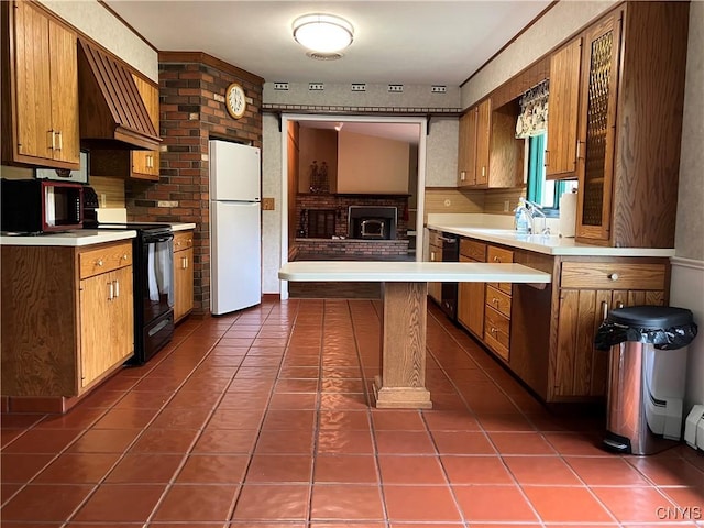 462 Hacadam Rd, Frankfort, NY 13456 - kitchen with black appliances, custom exhaust hood, light countertops, and dark tile patterned flooring