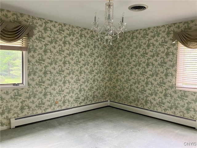 462 Hacadam Rd, Frankfort, NY 13456 - unfurnished room featuring healthy amount of natural light, a chandelier, and wallpapered walls