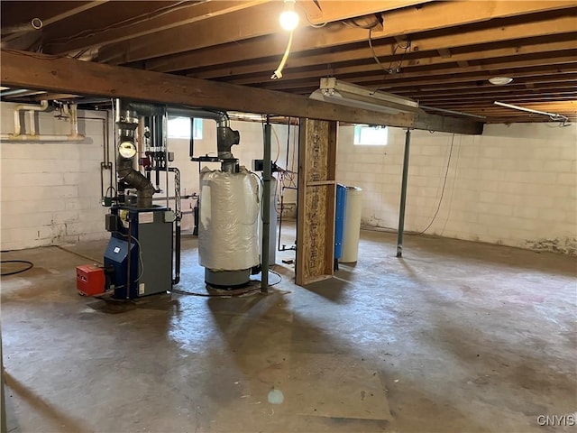 462 Hacadam Rd, Frankfort, NY 13456 - basement featuring a heating unit, a water softener system, and healthy amount of natural light