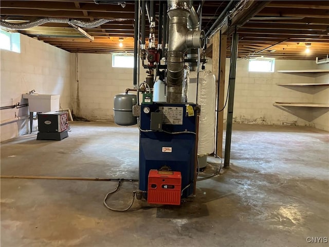 462 Hacadam Rd, Frankfort, NY 13456 - below grade area featuring a heating unit and a sink