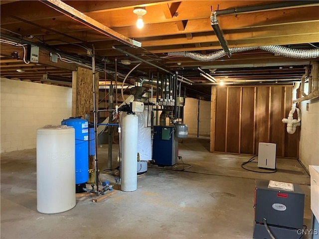 462 Hacadam Rd, Frankfort, NY 13456 - unfinished below grade area with a water pressure tank, a heating unit, a water softener, and concrete block wall