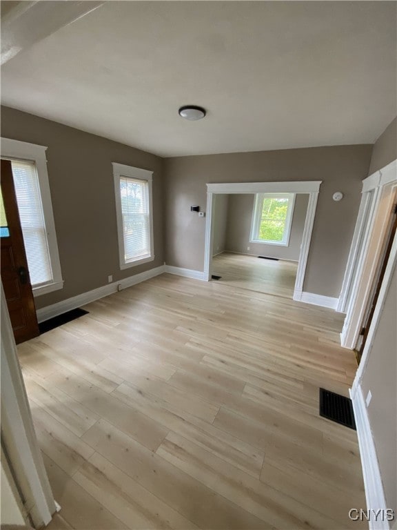 409 W 1st St S, Fulton, NY 13069 - unfurnished room featuring baseboards and light wood finished floors