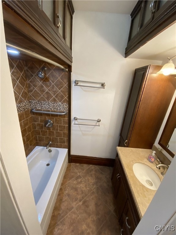 409 W 1st St S, Fulton, NY 13069 - full bathroom with vanity, tile patterned flooring, and washtub / shower combination