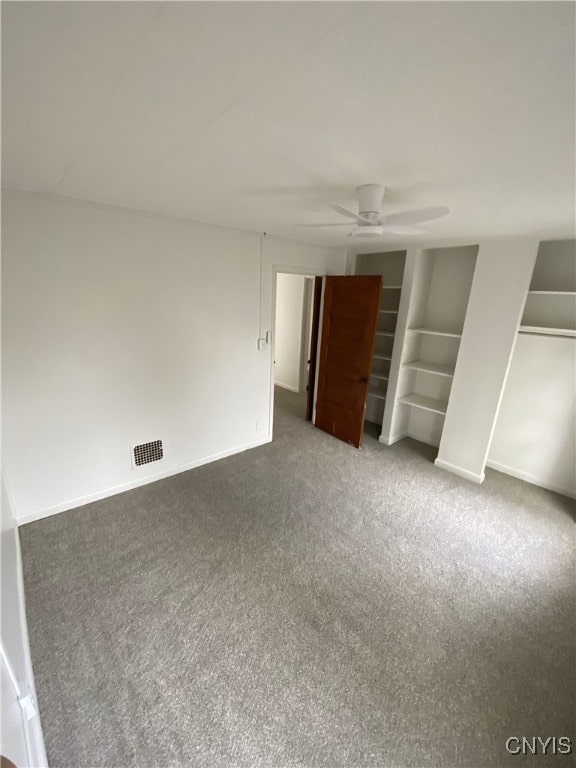 409 W 1st St S, Fulton, NY 13069 - unfurnished bedroom featuring carpet floors and ceiling fan