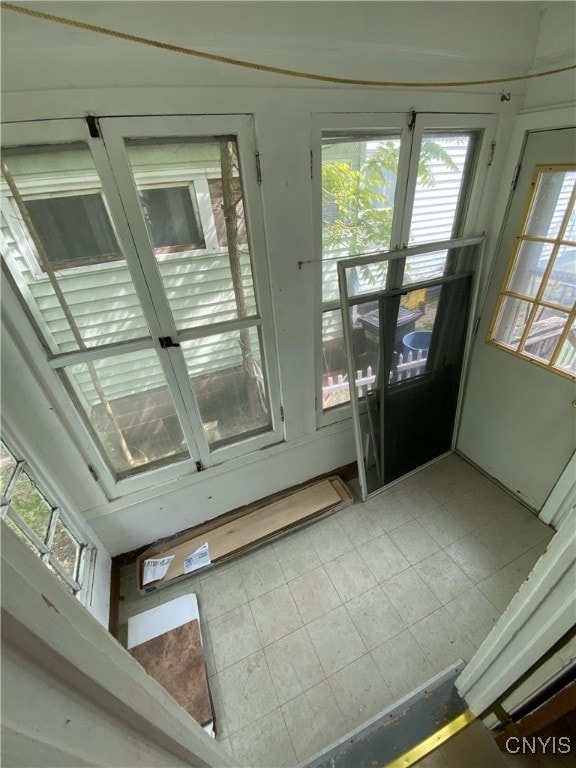 409 W 1st St S, Fulton, NY 13069 - unfurnished sunroom featuring french doors