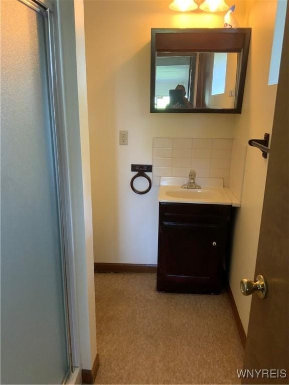 926 Bluff Rd, Carlton, NY 14571 - bathroom with vanity, tasteful backsplash, and a shower stall