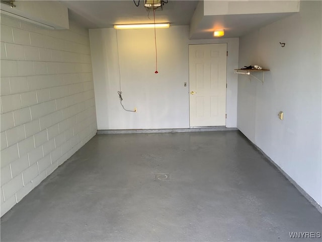 926 Bluff Rd, Carlton, NY 14571 - garage with concrete block wall and a wall mounted AC