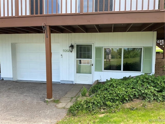 926 Bluff Rd, Carlton, NY 14571 - view of exterior entry with a garage