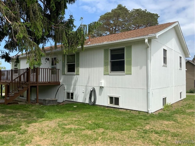 926 Bluff Rd, Carlton, NY 14571 - back of house featuring a lawn, a wooden deck, stairway, and a shingled roof