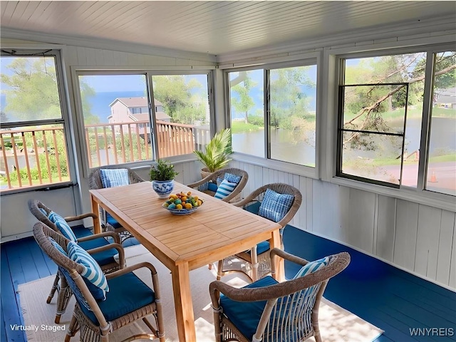 926 Bluff Rd, Carlton, NY 14571 - sunroom featuring outdoor dining space and wood finished floors