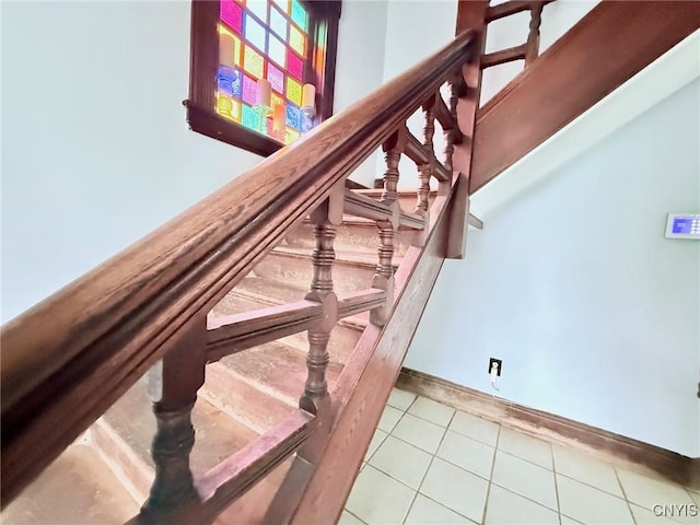 19 Elm Ave, Homer, NY 13077 - stairway featuring tile patterned floors and baseboards