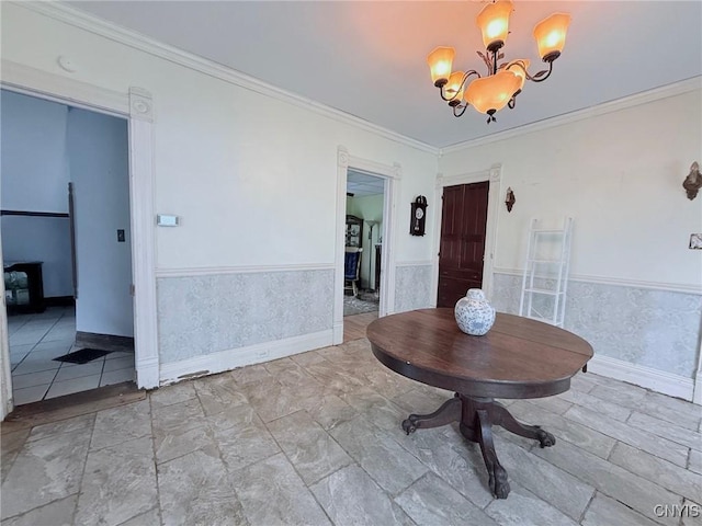 19 Elm Ave, Homer, NY 13077 - dining area featuring a chandelier, a wainscoted wall, and crown molding