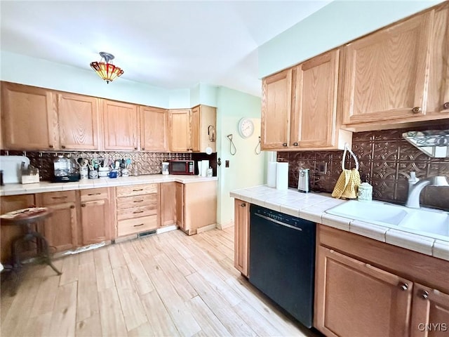 19 Elm Ave, Homer, NY 13077 - kitchen with dishwasher, backsplash, light wood-style floors, and light brown cabinets