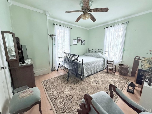 19 Elm Ave, Homer, NY 13077 - bedroom with ornamental molding, wood finished floors, and a ceiling fan