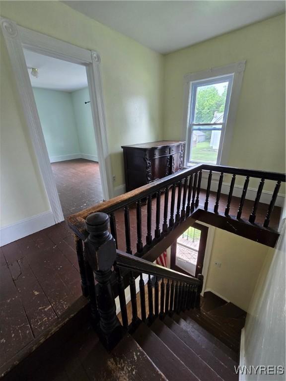 213 Highland Ave, Shelby, NY 14103 - stairway featuring hardwood / wood-style flooring and baseboards