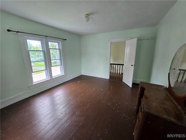 213 Highland Ave, Shelby, NY 14103 - empty room featuring dark wood-style flooring and baseboards
