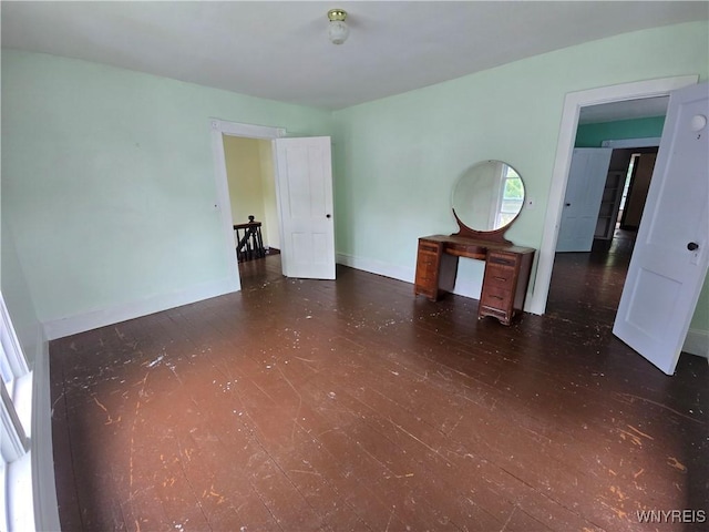 213 Highland Ave, Shelby, NY 14103 - empty room with wood finished floors and baseboards