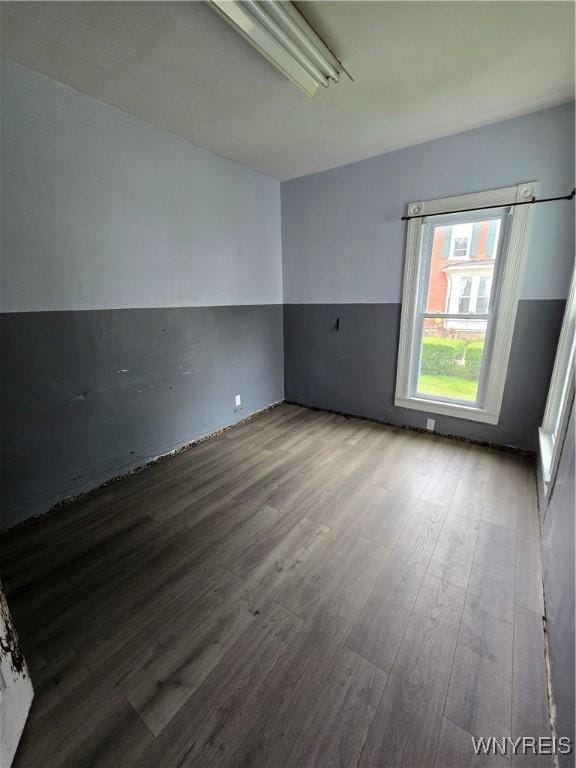 213 Highland Ave, Shelby, NY 14103 - unfurnished room with wood finished floors