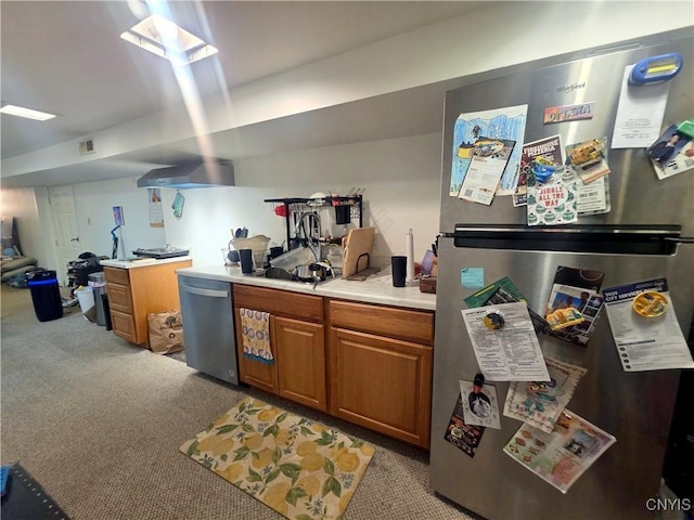 244 Scottholm Ter, Syracuse, NY 13224 - kitchen with stainless steel appliances, light colored carpet, brown cabinetry, range hood, and light countertops