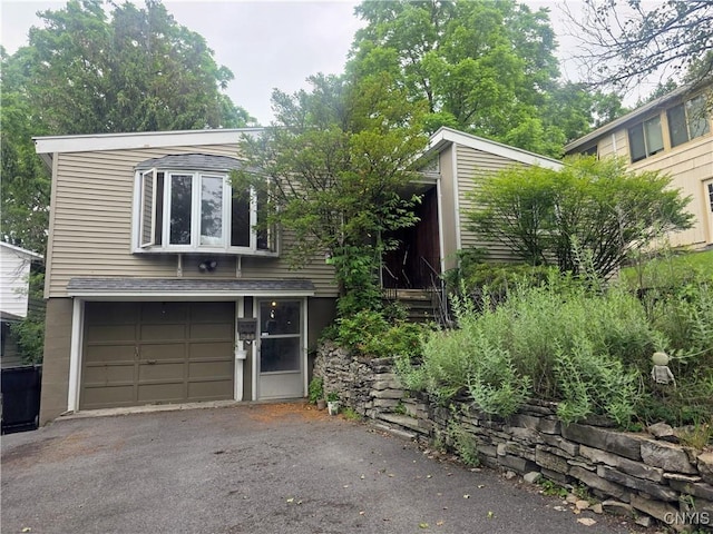 244 Scottholm Ter, Syracuse, NY 13224 - view of front of house featuring driveway and a garage