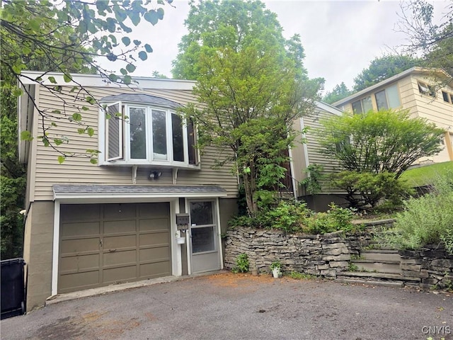 244 Scottholm Ter, Syracuse, NY 13224 - view of front of home featuring a garage and driveway