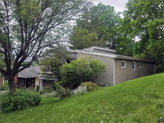 244 Scottholm Ter, Syracuse, NY 13224 - view of property exterior with a yard
