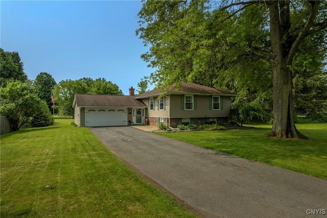 8272 Northgate Dr, Rome-Outside, NY 13440 - split level home with asphalt driveway, an attached garage, a front lawn, and a chimney