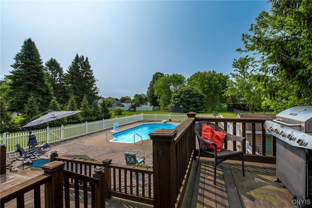 8272 Northgate Dr, Rome-Outside, NY 13440 - view of swimming pool with a grill, a fenced backyard, a patio, and a wooden deck