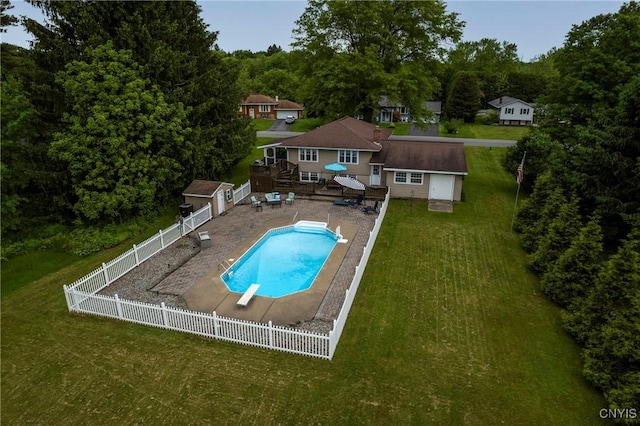 8272 Northgate Dr, Rome-Outside, NY 13440 - view of swimming pool featuring a fenced backyard, an outbuilding, a wooden deck, a diving board, and stairs
