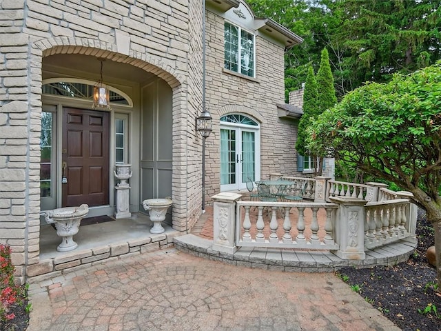 1010 Plank Rd, Penfield, NY 14580 - property entrance with stone siding and french doors