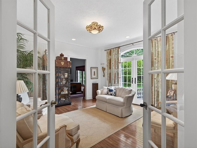 1010 Plank Rd, Penfield, NY 14580 - living area featuring french doors, hardwood / wood-style flooring, and recessed lighting