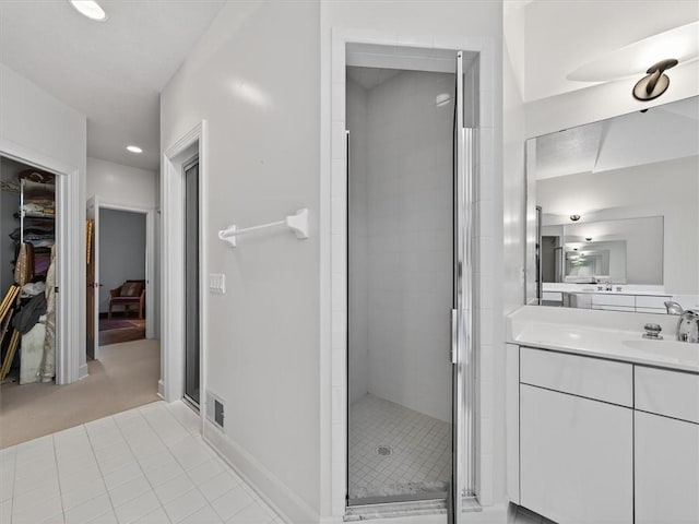 1010 Plank Rd, Penfield, NY 14580 - full bath featuring a shower stall, vanity, a spacious closet, and recessed lighting